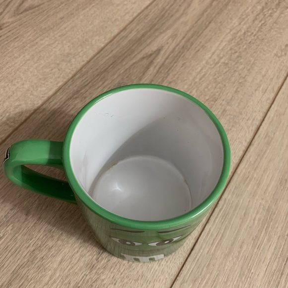 Green M & M’s Coffee Mug. Very Good Condition. No chips or cracks.  4” H - Picture 5 of 11